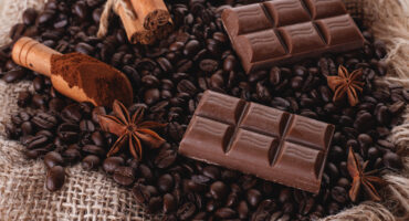 Chocolate,,Coffee,Beans,,Anise,On,Wooden,Background