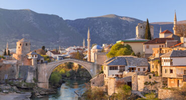 Skyline,Of,Mostar,With,The,Mostar,Bridge,,Houses,And,Minarets,