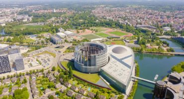 Strasbourg-France.-The-complex-of-buildings-is-the-European-Parliament-the-European-Court-of-Human-Rights-the-Palace-of-Europe-Aerial-Viewshutterstock_1549304633