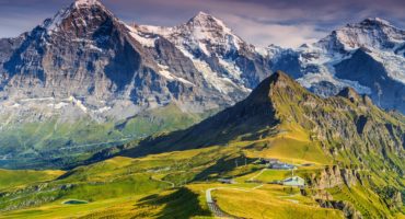 Stunning-alpine-panorama-with-JungfrauMonchEiger-North-face-and-Mannlichen-cable-car-stationGrindelwaldBernese-OberlandSwitzerlandEuropeshutterstock_345716333